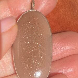 Artisan Peach moonstone pendant with brass and sterling silver